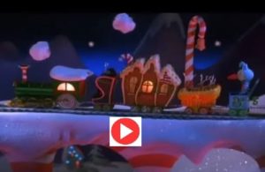 Monsieur Jack arrive au village u père Noël et admire un train tout en sucreries